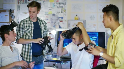 4K Young computer programmers trying out virtual reality viewers 스톡 동영상 54454186