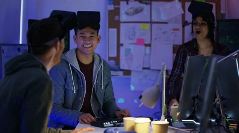 4K Young computer programmers trying out virtual reality viewers 스톡 동영상 60954743