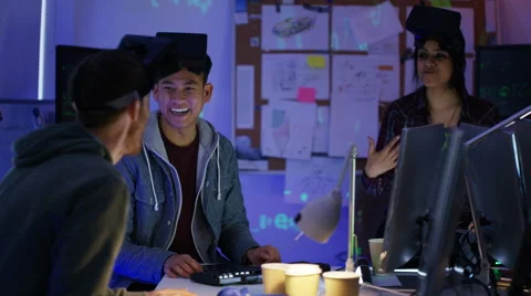 4K Young computer programmers trying out virtual reality viewers 스톡 동영상 60956996