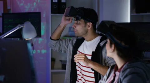 4K Young computer programmers trying out virtual reality viewers 스톡 동영상 60958307