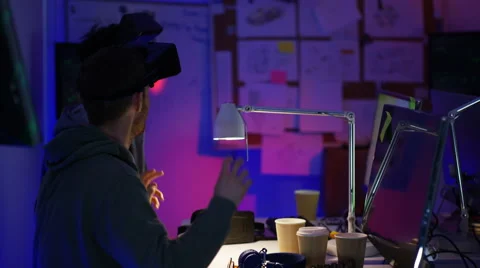 4K Young computer programmers trying out virtual reality viewers Stock Footage 60958690