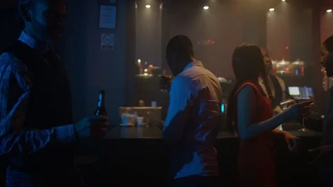 4K Young Diverse Group Chatting &amp; Socializing In City Bar Video stock 75642795