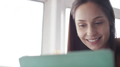 4K Young female using her digital tablet, in slow motion Video stock 56138772