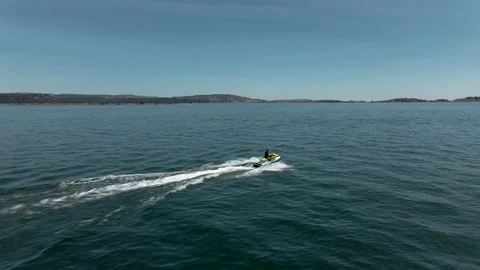 4K The young lady fast run on jetski Stock Footage 134667474