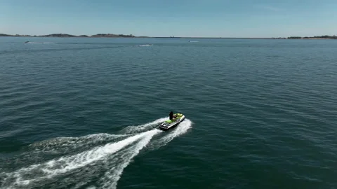 4K The young lady run on jetski Stock Footage 134666938