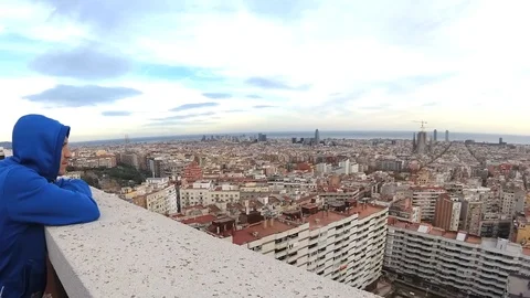 4k Young man contemplates views from the roof Stock Footage 120697094