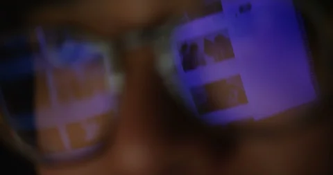4K Young man doing internet search on computer with screen reflection in glasses Stock Footage 87119554