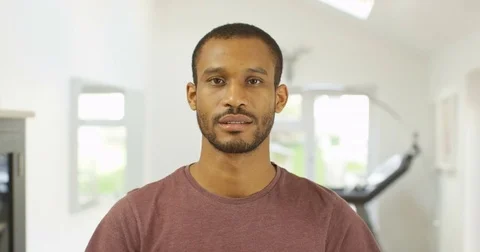 4K Young man making video call &amp; looking bored but trying to look interested Stock Footage 82292987