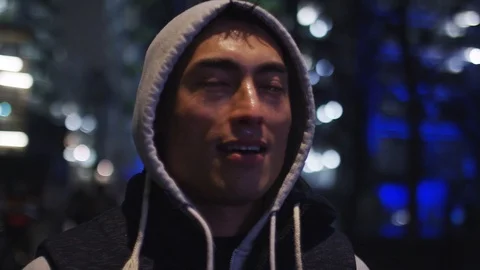 4K Young man sweating after a run in the city at night Video stock 72661172