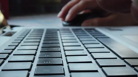 4K. Young woman is using her laptop computer in slow motion footage close up Stock Footage 138816853
