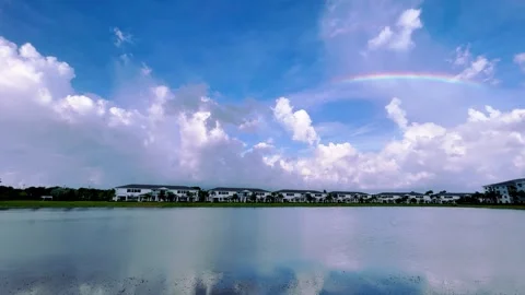 4K Zoom In Florida Lake Clouds Rainbow Stock Footage 267928350