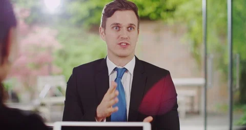 4K Zoom out from close up of talkative, expressive businessman at job interview Video stock 110966783