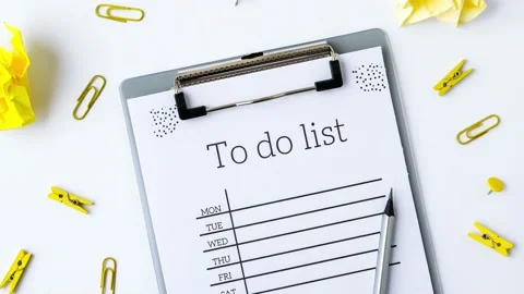 4k zoom in out To do list on white background with office supplies. Planning Stock Footage 220334192