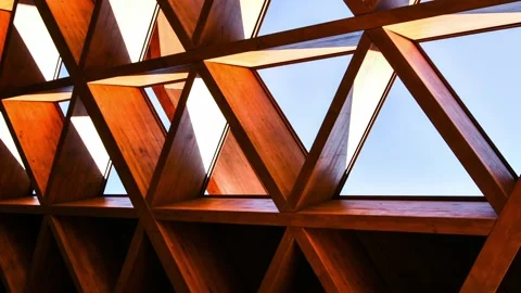 4k zoom in out Roofing Construction. Wooden Roof Frame House Construction Stock Footage 206046861