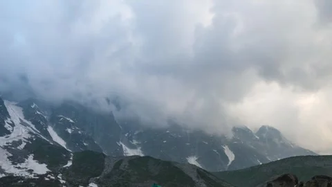 4K Zoom in Time Lapse of dark monsoon clouds moving over mountains in Manali, Hi Stock Footage 279749582