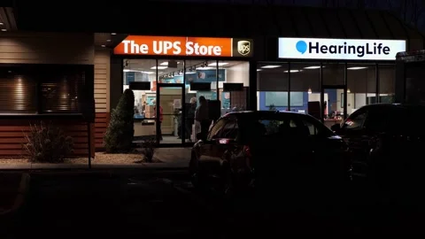 4K60fps, UPS store strip mall customers wait in line to mail holiday packages Stock Footage 144453590