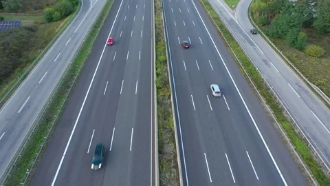 4K.Aerial view of highway road interchange with busy urban traffic Stock Footage 255610027