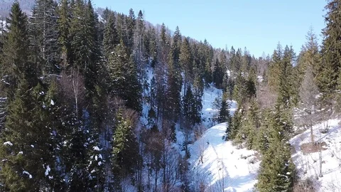  4k.Aerial. Winter time in mountain hill Stockbeeldmateriaal 87204164
