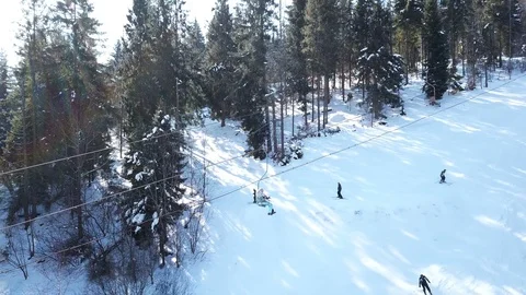   4k.Aerial. Winter time in mountain ski resort. Over  skiing lift Stock-Footage 87202603