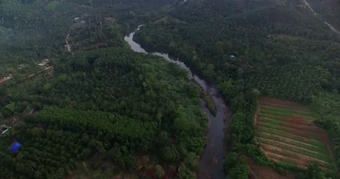 4k,Drone fly over the clouds in rain forest at southern of Thailand Stock Footage 138757132
