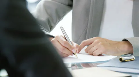 4k,Successful business woman signing contracts and shaking hands to close deal Stock Footage