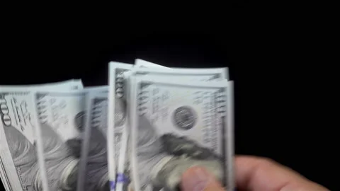 4Kt view on hand counts dollar bills Stock Footage 197014322