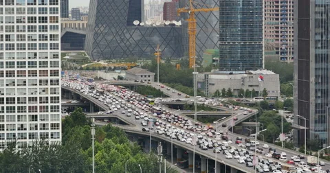 4k,timelapse,heavy traffic through BeiJing central business district,building. Stock Footage