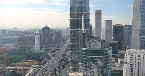 4k,timelapse,heavy traffic through BeiJing central business district,building. Stock Footage