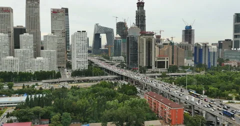 4k,timelapse,heavy traffic through BeiJing central business district,building. Stock Footage