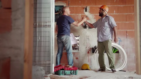 4of11 Men at work in construction site, manual workers Stock Footage 26392282