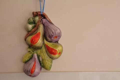 4S3A0758 A cluster of several ripe ceramic figs.there is space for text Stock-Fotos