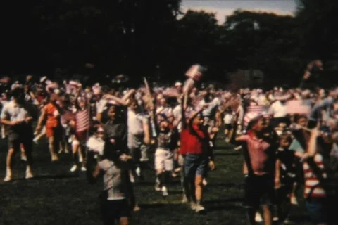 4th of July, kids waving flags Vídeo Stock 1086364