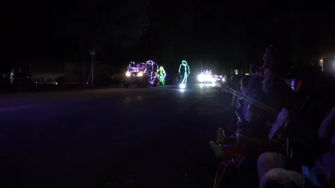 A 4th of July light parade at night in a small town Stock Footage 200855632