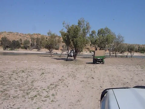 4WDS GOING TO CROSS RIVER Stock Footage 100384143