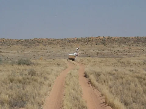 4WDS THROUGH THE DESERT Stock Footage 100520563