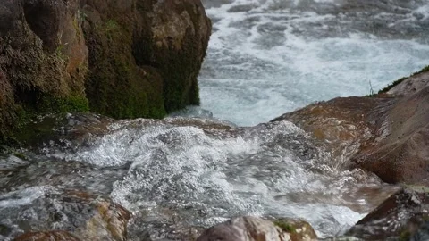 4x slow motion video of a clear mountain river with transparent water. When.. Stock Footage 311227387