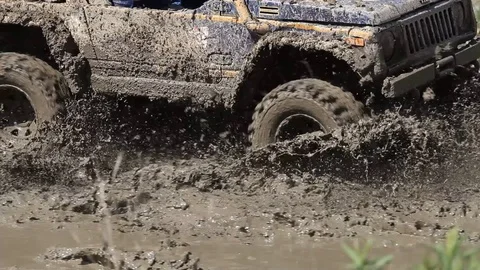 4x4 car crossing  the mud Stock Footage 71503854