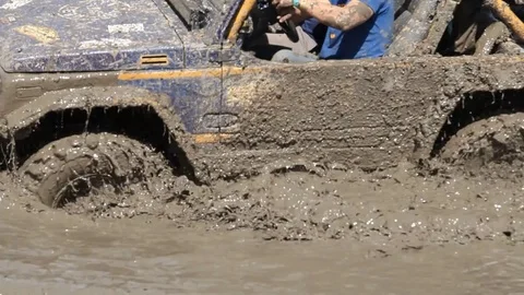 4x4 car crossing  the mud Stock Footage 71504128
