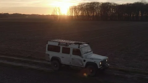 4x4 on a dirt track at sunset Video stock 108657019