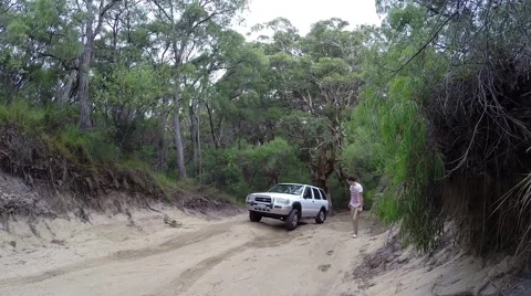 4x4 getting stuck uphill on offroad track Stock Footage 61486335