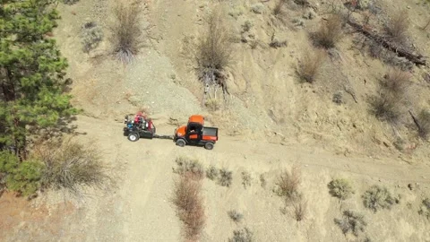 4X4 Pulling Trailer Down Mountain Road Drone Shot Stock Footage 146553286