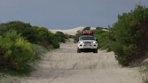 4x4 Vehicle driving over bumpy sand road Stock Footage 70717085