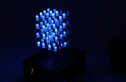 4x4x4 LED cube light displaying blue color lights on dark. Creative projects Stock Photos