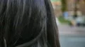 5 in 1 video! Young woman turn head and smile in the city by building background 4k or 4k+ Resolution