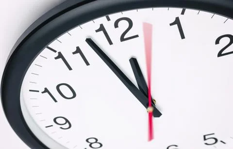 5 to 12 clock time concept Stock Photos