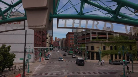 5-30-26, Milwaukee, WI, USA - alt flying under gateway to Third Ward Stock Footage 336082844