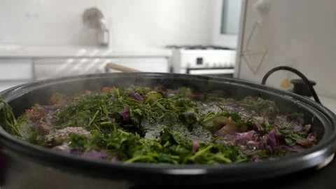 5 9 Woman cooking in kitchen, pot with cooked vegetables 스톡 동영상 120675813