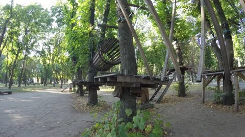 5 al.mp4in the children's amusement park in the trees. 库存影片 59144089