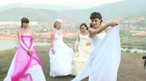 5 brides on the top of a mountain Stock Footage 11224382