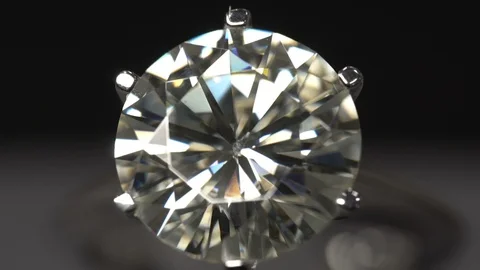 5 carat diamond ring macro shooting. Diamond facets close up Stock Footage 118685945